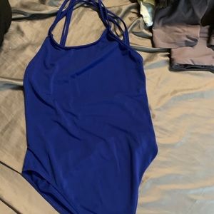 blue backless body suit